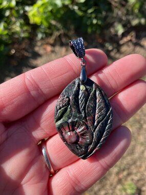 Floral Carved Dragons Blood Jasper Stone Pendant